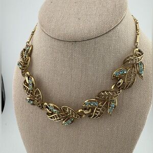 Coro Vintage Goldtone Leaf Necklace with Aquamarine Rhinestones.